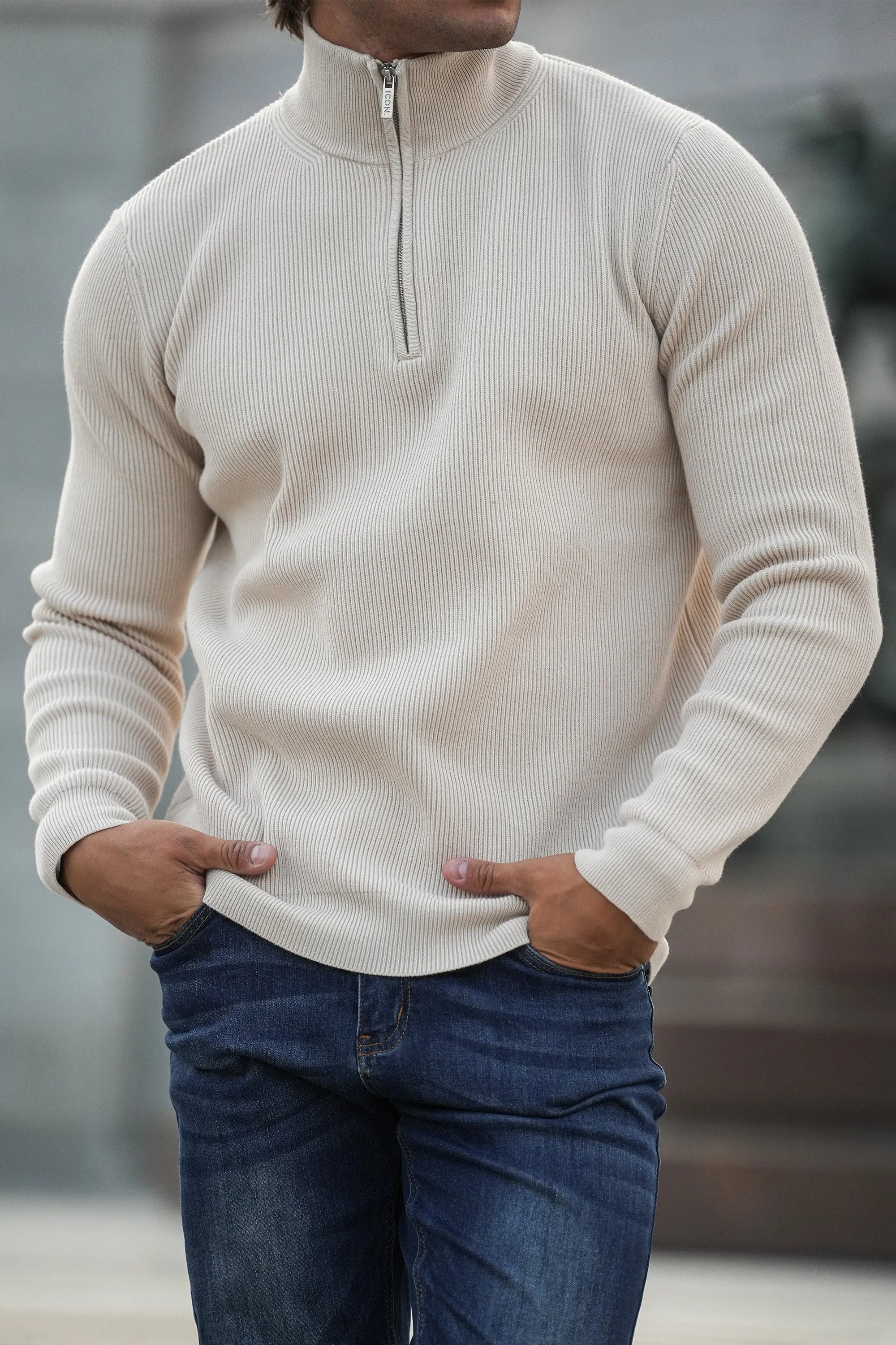 THE RENZO HALF ZIP SWEATER