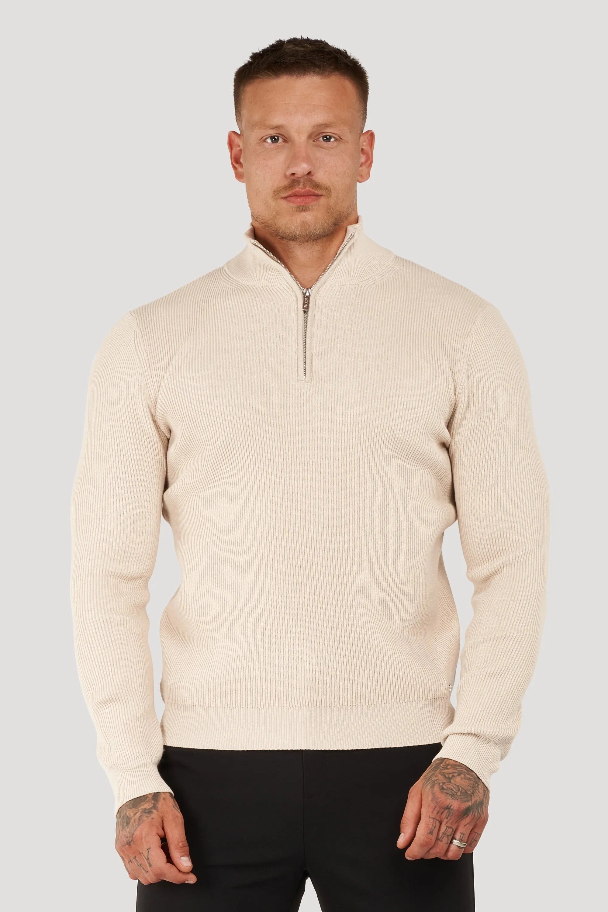 THE RENZO HALF ZIP SWEATER